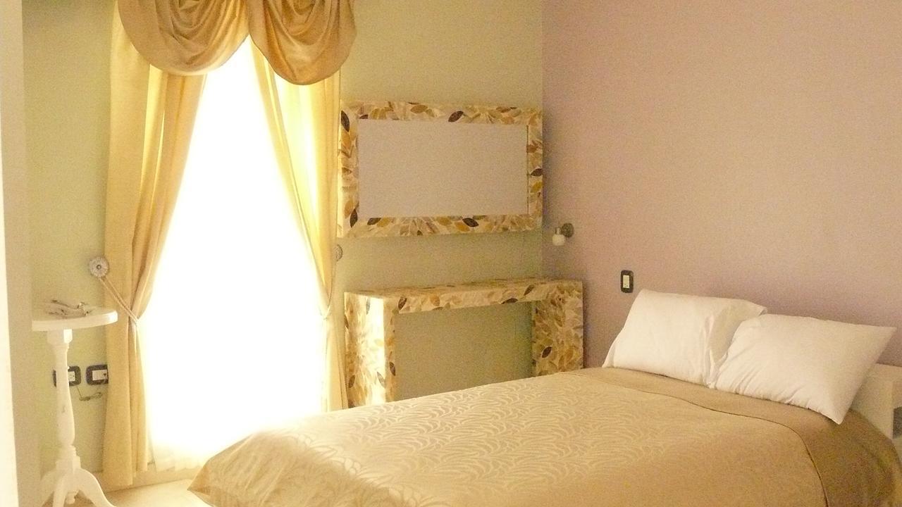 Hotel Cocoyotla Чолула Экстерьер фото